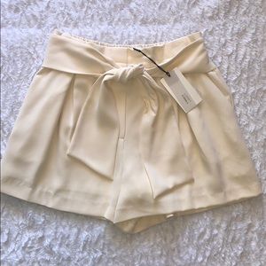 a loves a cream paper bag shorts